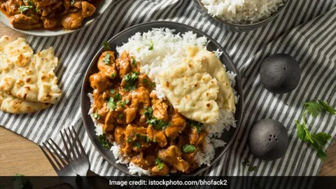 1 Chicken Curry in, 1 rice and 2 Rotis